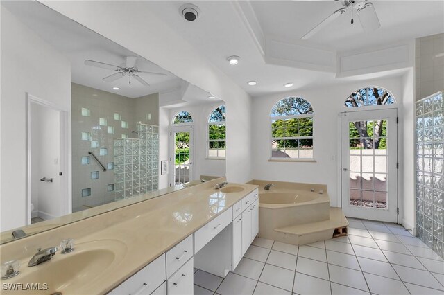 bathroom with separate shower and tub, tile patterned floors, vanity, and ceiling fan