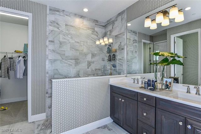 bathroom featuring vanity and a tile shower