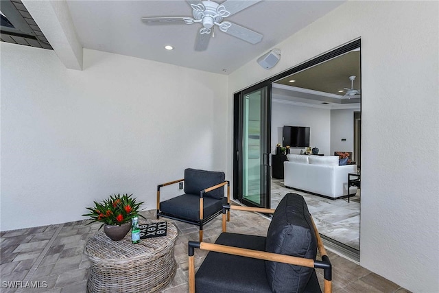 view of patio with ceiling fan