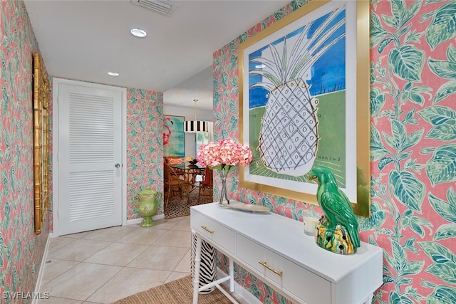 bathroom featuring tile patterned flooring and vanity