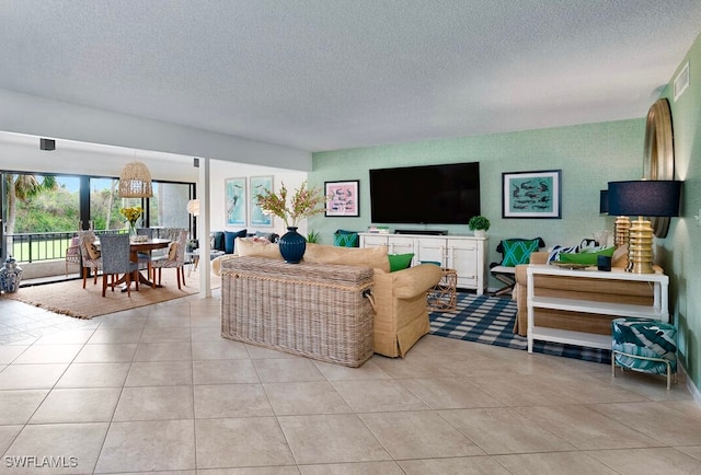 tiled living room with a textured ceiling