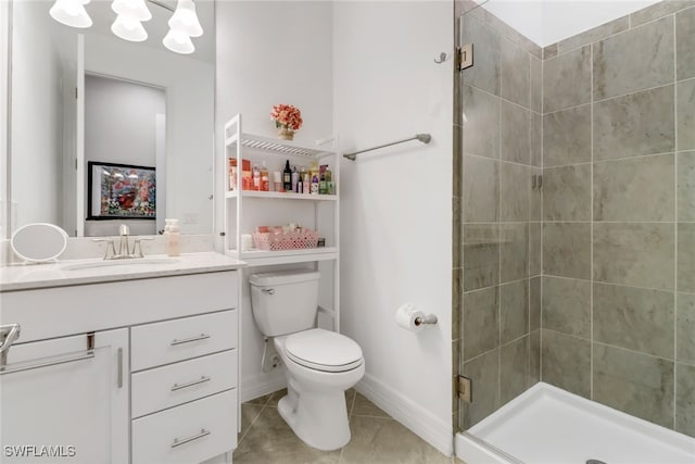 bathroom featuring walk in shower, vanity, toilet, and tile patterned floors