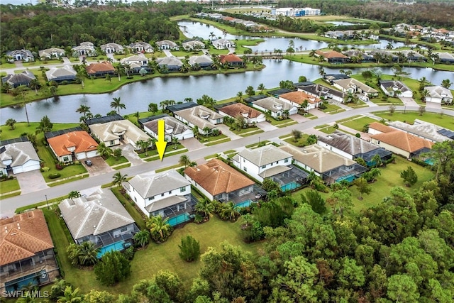 drone / aerial view with a water view