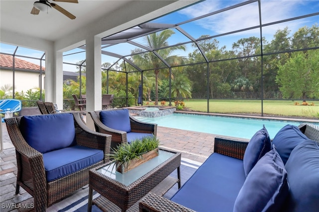 view of pool featuring glass enclosure, a patio, an in ground hot tub, and ceiling fan