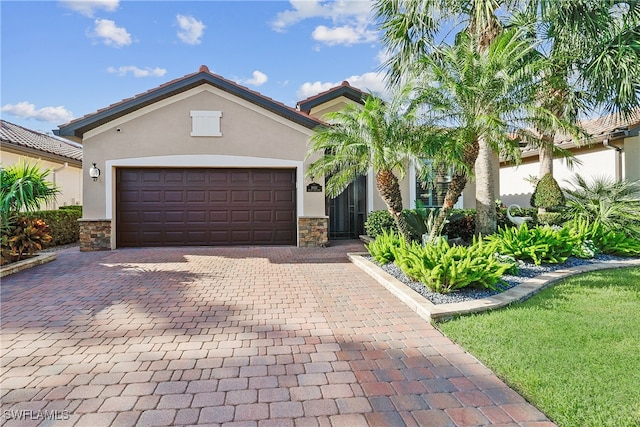 view of front of home featuring a garage