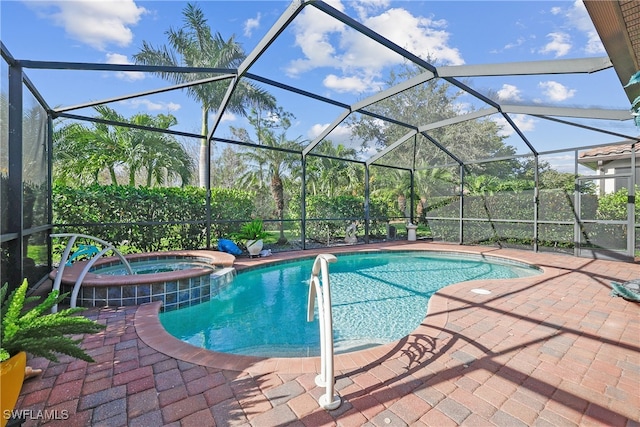 view of swimming pool featuring an in ground hot tub, glass enclosure, and a patio area