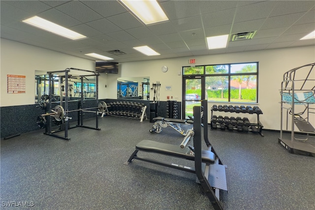 gym with a drop ceiling