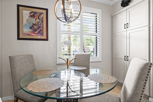 dining area featuring light tile patterned floors, crown molding, and a notable chandelier