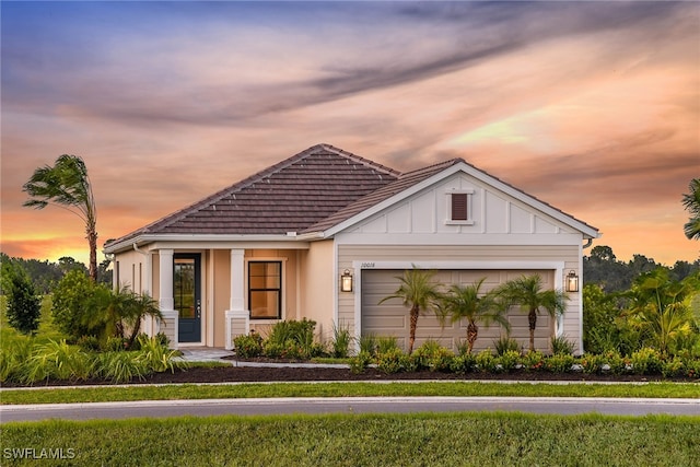 view of front of property featuring a garage