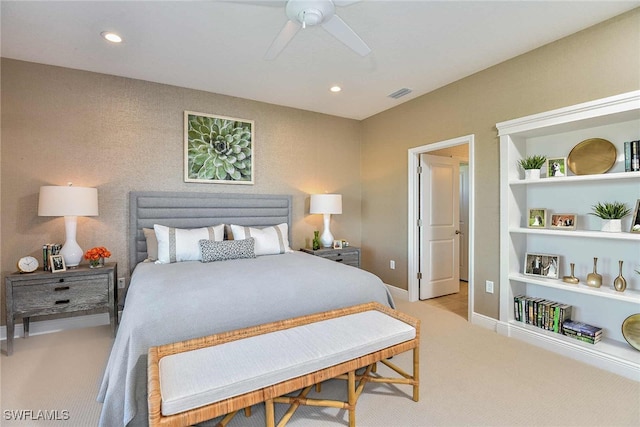 bedroom featuring light carpet and ceiling fan