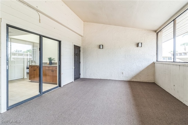 unfurnished sunroom with a healthy amount of sunlight