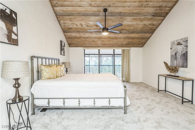 bedroom with lofted ceiling, wood ceiling, light colored carpet, and ceiling fan