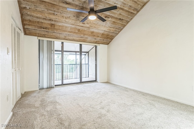 empty room with ceiling fan, wood ceiling, vaulted ceiling, and carpet floors