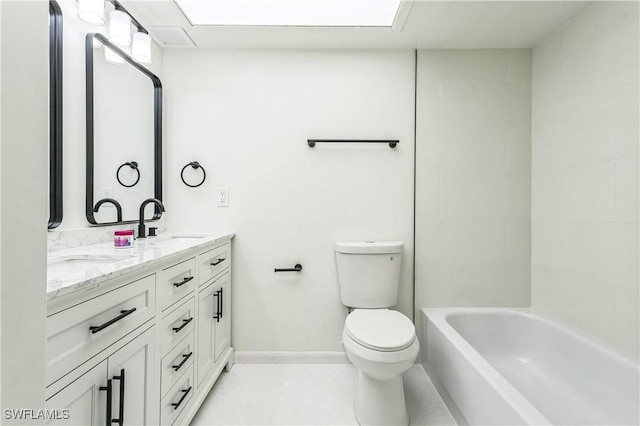 16448 Timberlakes Dr Unit 202, Fort Myers, FL 33908 - full bathroom with double vanity, toilet, and baseboards