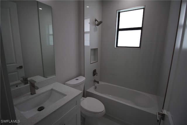 full bathroom featuring shower / bathing tub combination, vanity, and toilet