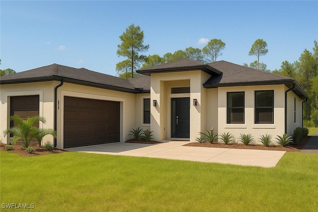 prairie-style house with stucco siding, an attached garage, driveway, and a front yard