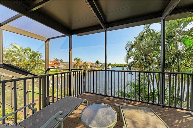 sunroom with a water view