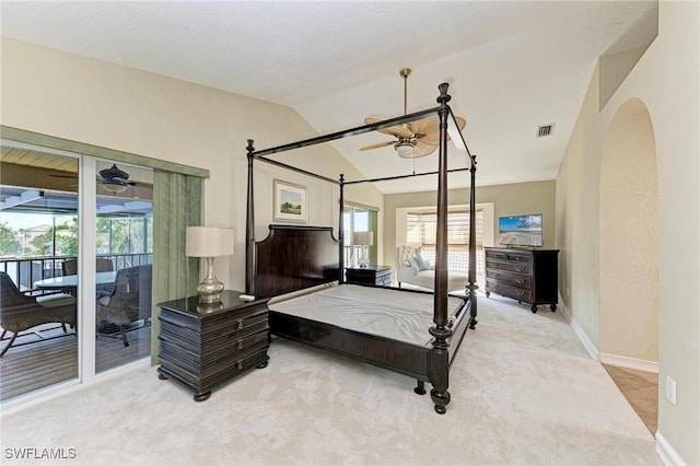 bedroom featuring access to outside, light colored carpet, vaulted ceiling, and ceiling fan