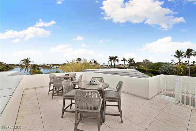 view of patio / terrace featuring a water view