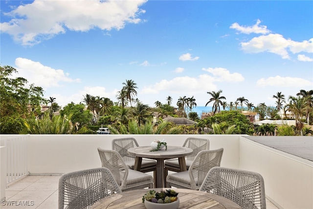 balcony featuring a water view