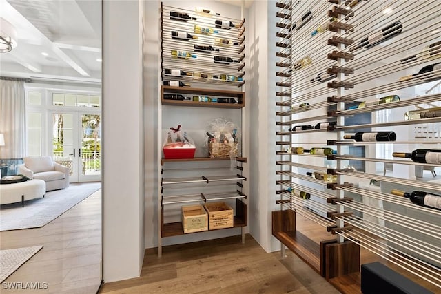 12 Sabre Ln, Naples, FL 34102 - wine cellar featuring wood finished floors, recessed lighting, and beam ceiling