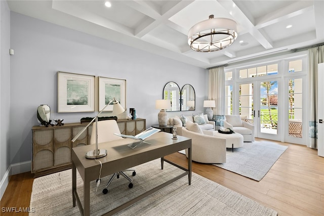 interior space with beam ceiling, french doors, light hardwood / wood-style floors, and coffered ceiling