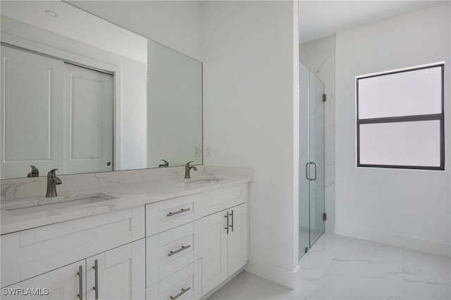 735 Goldrock Rd, Lehigh Acres, FL 33974 - bathroom with marble finish floors, a marble finish shower, baseboards, and double vanity