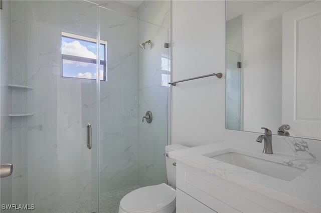 735 Goldrock Rd, Lehigh Acres, FL 33974 - full bath featuring toilet, a marble finish shower, and vanity