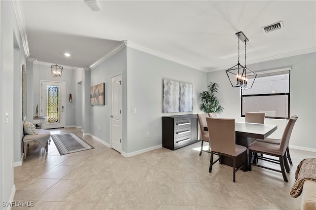 dining room featuring light tile patterned floors, a chandelier, and ornamental molding