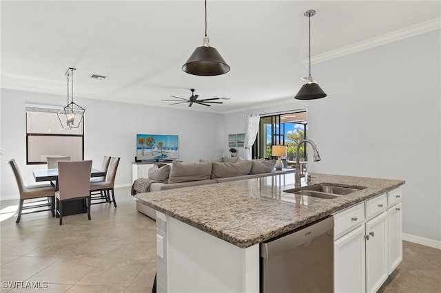 kitchen with decorative light fixtures, white cabinetry, sink, stainless steel dishwasher, and a center island with sink