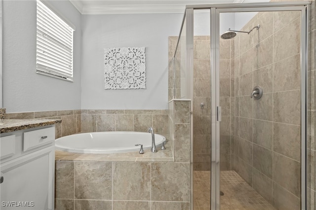 bathroom featuring vanity, crown molding, and plus walk in shower