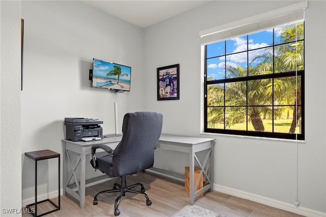 office space featuring light hardwood / wood-style floors