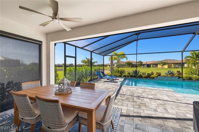 view of pool featuring ceiling fan