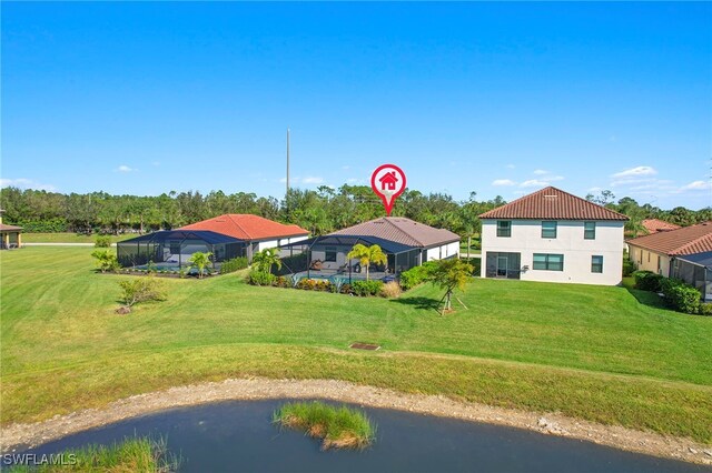 10708 Essex Square Blvd, Fort Myers, FL 33913 - rear view of house featuring a yard and glass enclosure