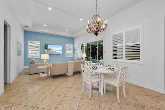 dining area featuring recessed lighting, a wealth of natural light, a notable chandelier, and light tile patterned floors