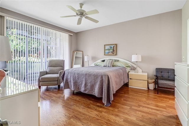 bedroom featuring light wood-type flooring and ceiling fan