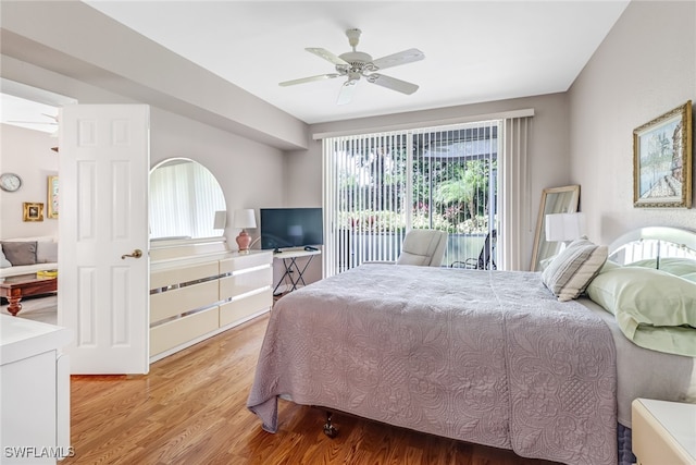 bedroom with hardwood / wood-style flooring and ceiling fan