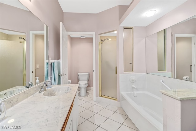 full bathroom featuring toilet, shower with separate bathtub, vanity, and tile patterned floors