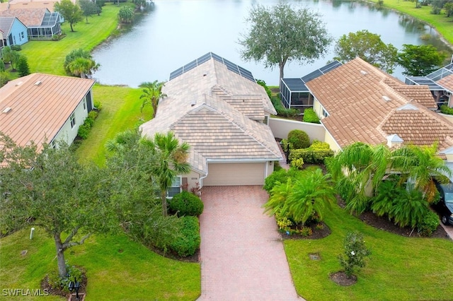 birds eye view of property featuring a water view