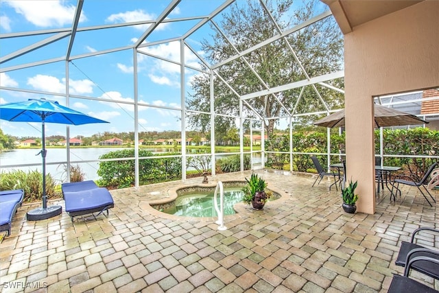 view of patio with a hot tub, a water view, and a lanai