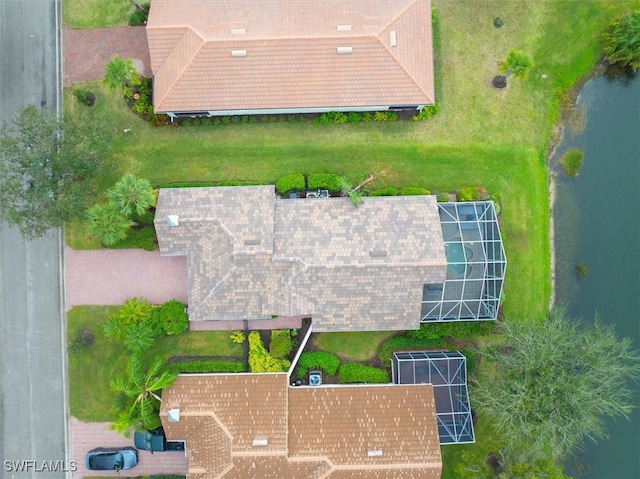 bird's eye view with a water view