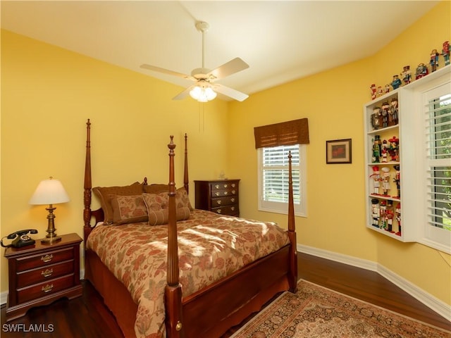 bedroom with ceiling fan and wood-type flooring