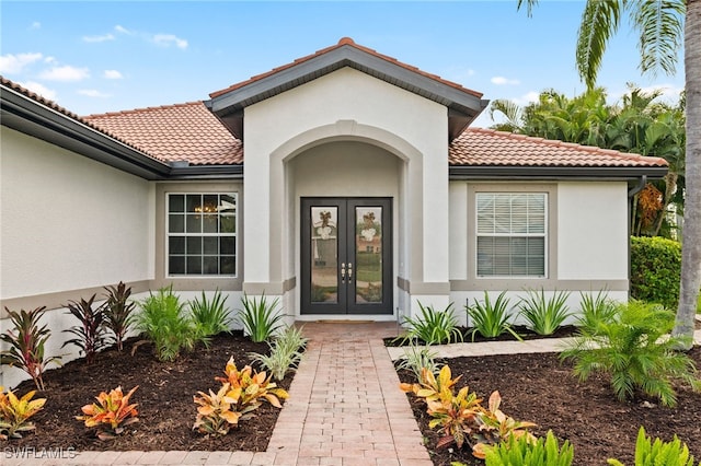 doorway to property featuring french doors