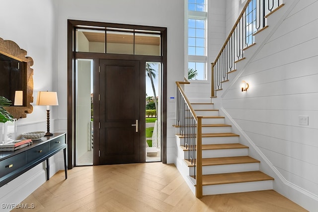 entrance foyer featuring light parquet flooring