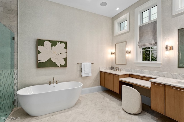 bathroom with shower with separate bathtub, vanity, and parquet floors