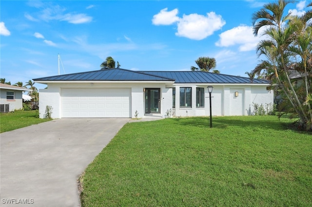 ranch-style home with a front lawn, a garage, and cooling unit