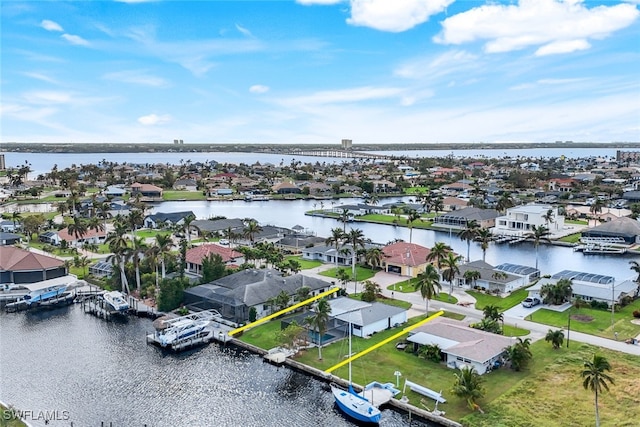 birds eye view of property featuring a water view