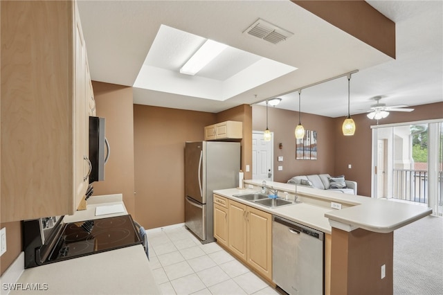 kitchen with sink, ceiling fan, light brown cabinetry, kitchen peninsula, and stainless steel appliances