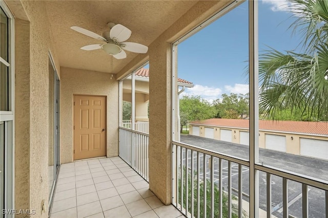 balcony featuring a ceiling fan