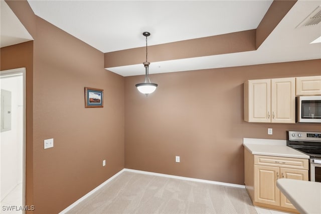 kitchen featuring pendant lighting, light colored carpet, stainless steel appliances, and electric panel